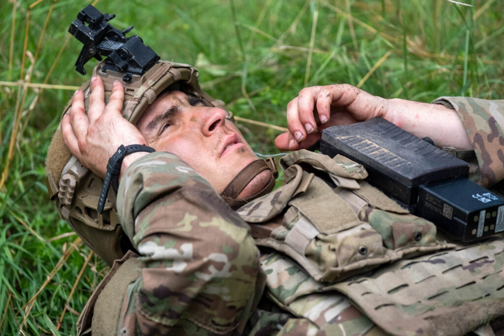 A U.S. soldier assigned to 3rd Platoon, 2nd Cavalry Regiment, maintains eye contact with the drone overhead as he operates a