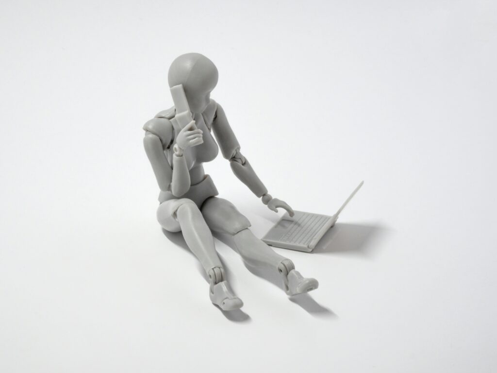 Robot using a laptop